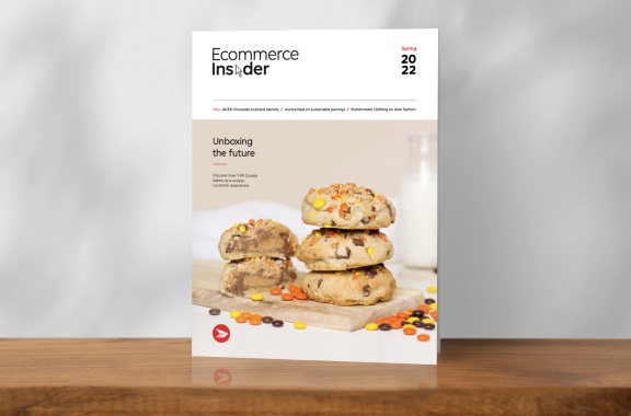 The cover of the spring 2022 edition of Ecommerce Insider magazine features a stack of YVR Cookie Co. cookies.