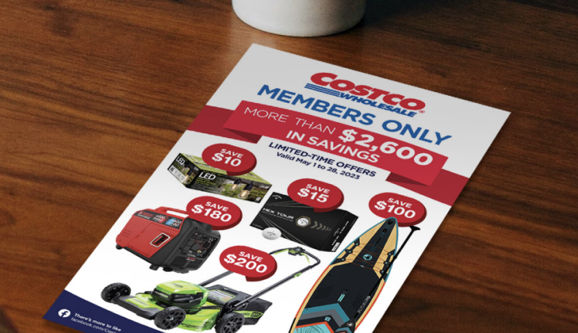 A Costco direct mail brochure on a table top.