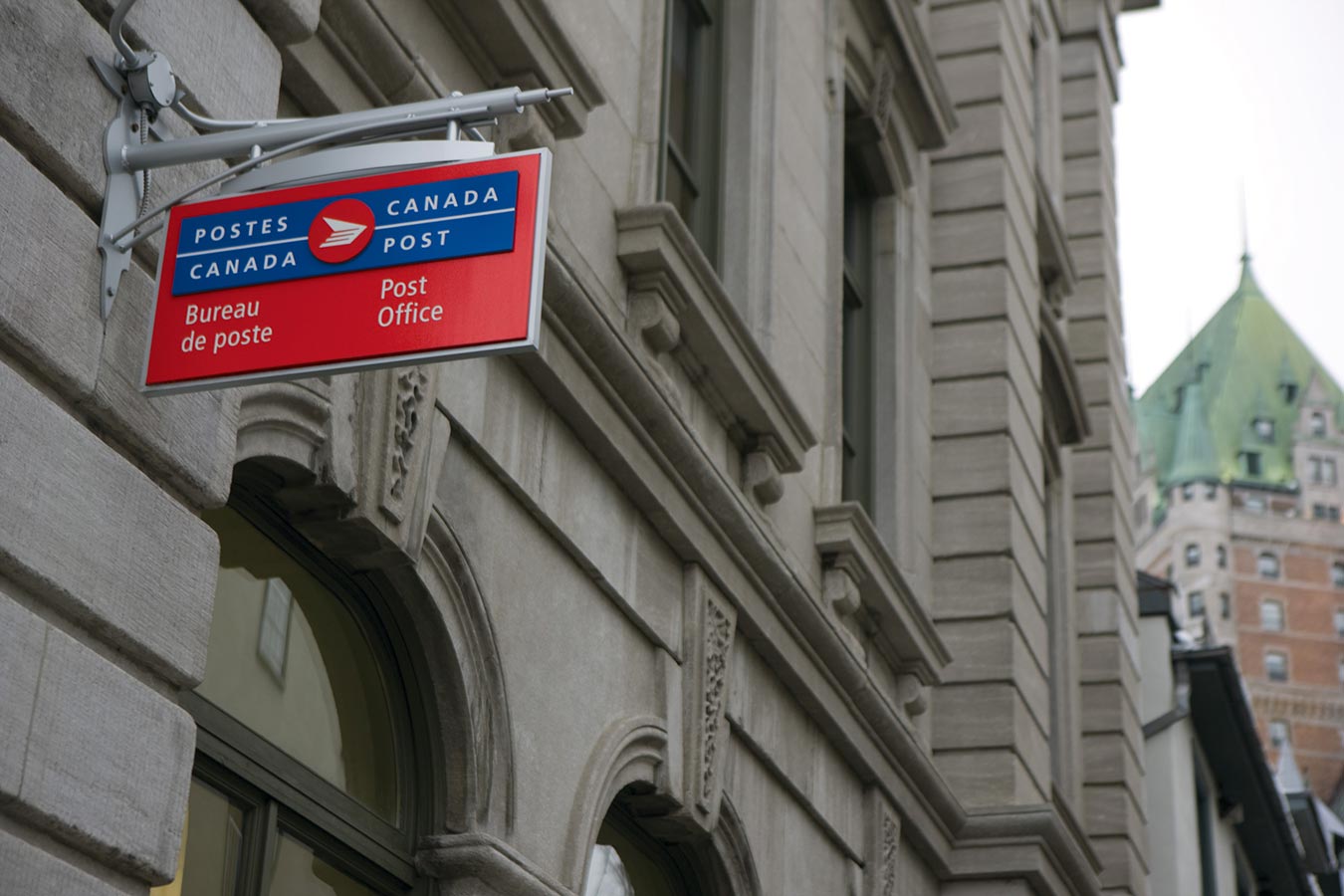 Post office sign on a building